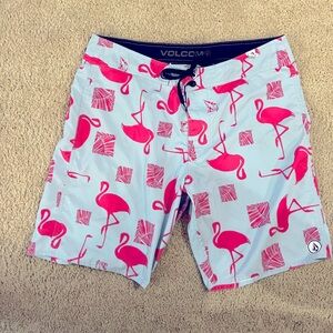 Mens 38 volcom swim trunks. Shorts. Never worn. Perfect condition. Back pocket
